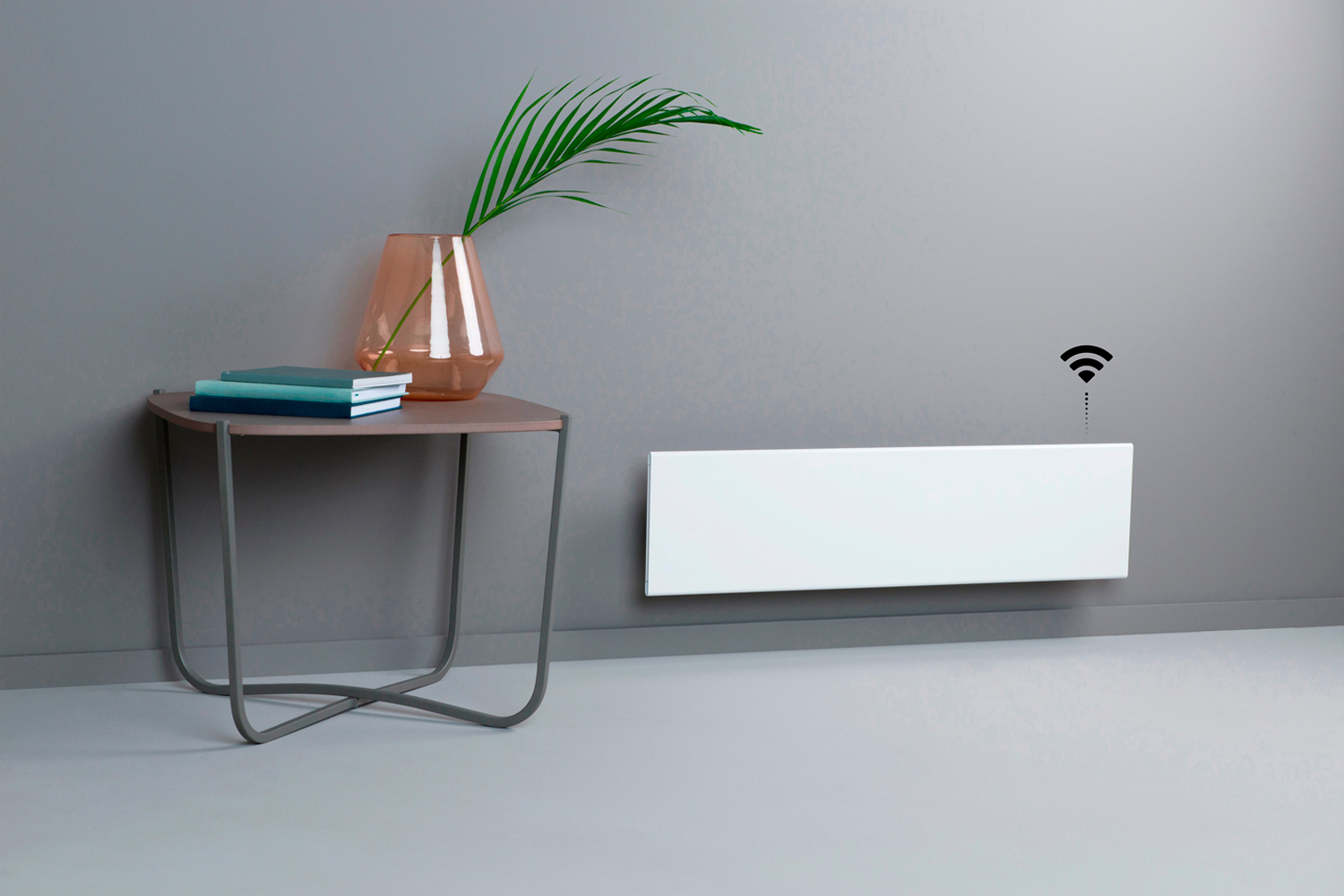 Низкий электрический конвектор ADAX NEO Low WiFi в светлом интерьере
